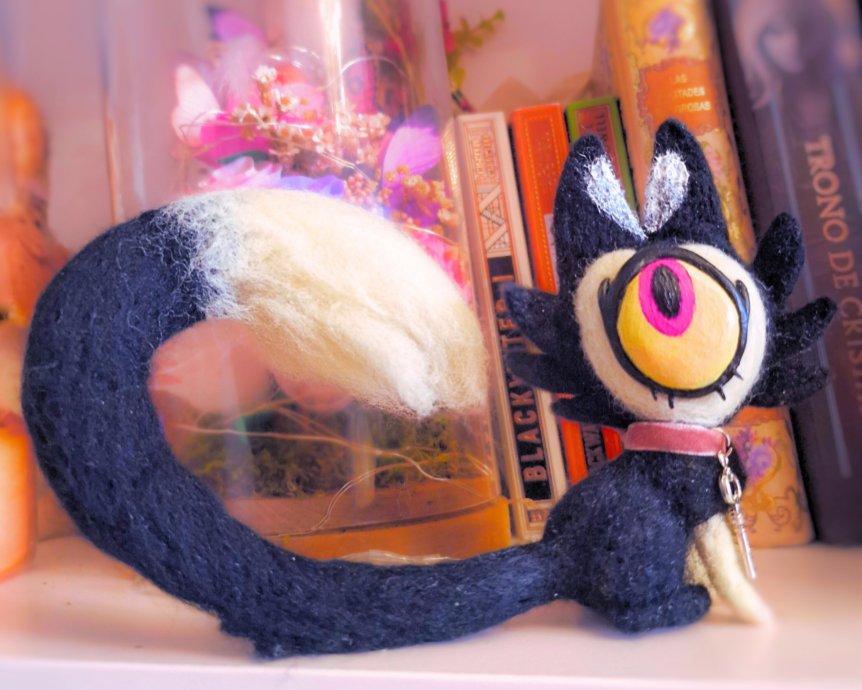 Keeke furry figure from the Hazbin Hotel series