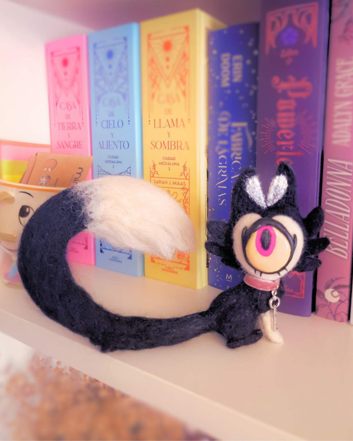 Keeke furry figure from the Hazbin Hotel series